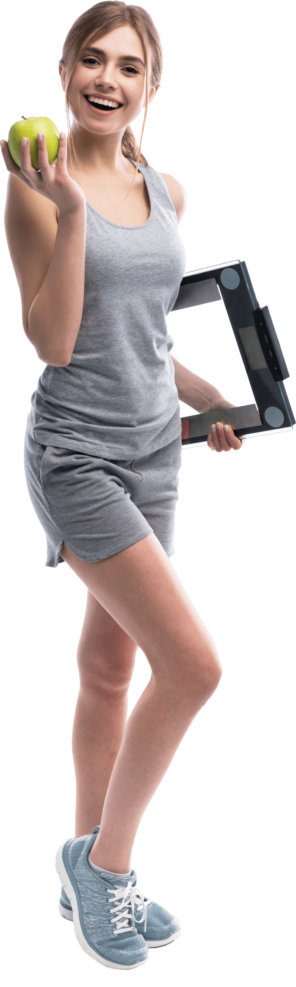 Beslenme ve tartı aletleri tutan fitness üyesi